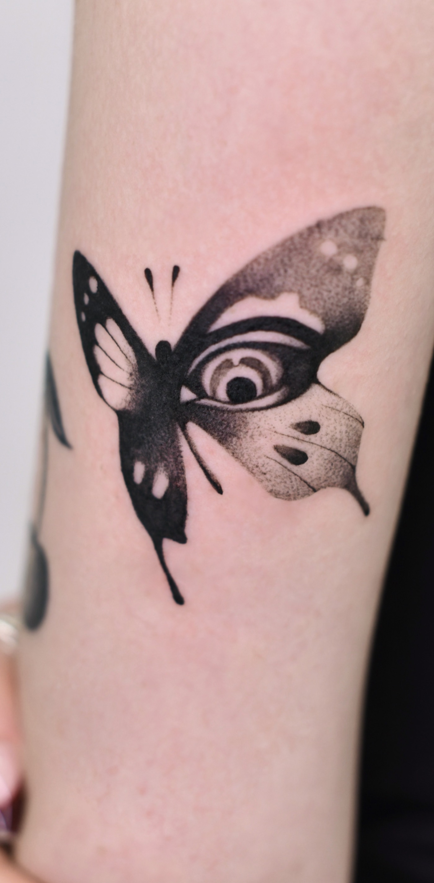 Dot work butterfly tattoo by Ivy at Blank-Leaving Tattoo Studio in Auckland