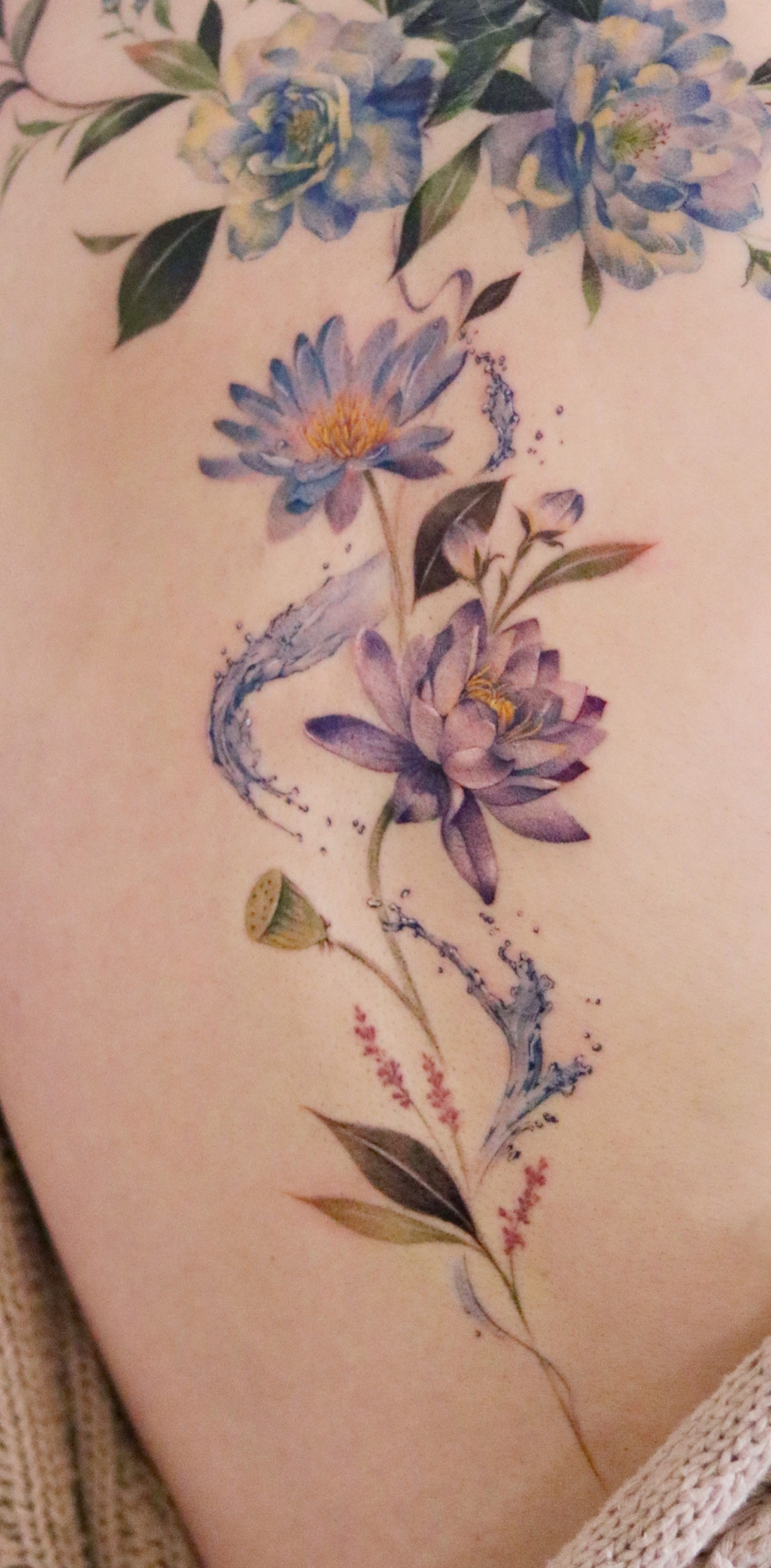 Water color floral tattoo by Lily at Blank-Leaving Tattoo Studio in Auckland